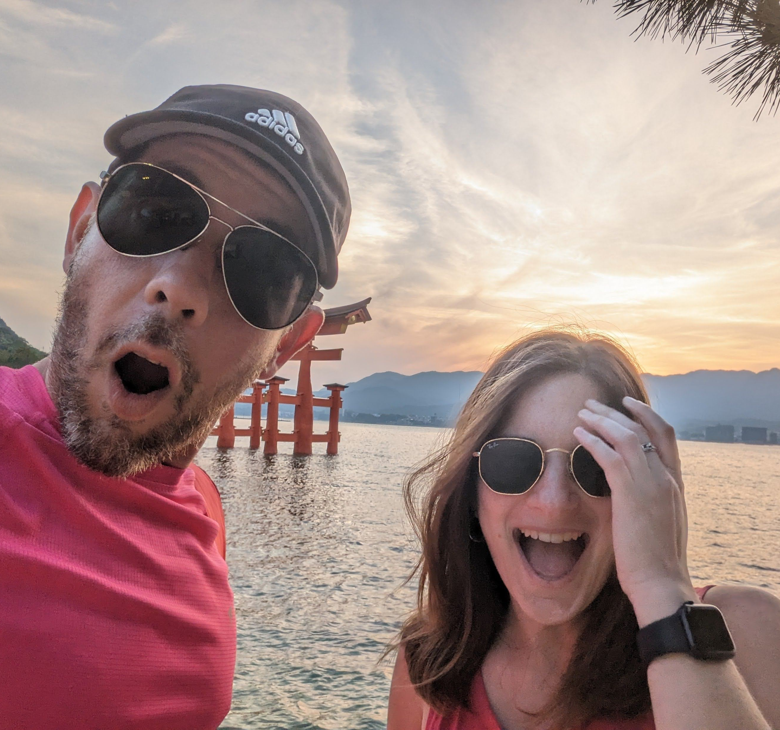 Fer (my partner) and I watching the sunset on Itsukushima island