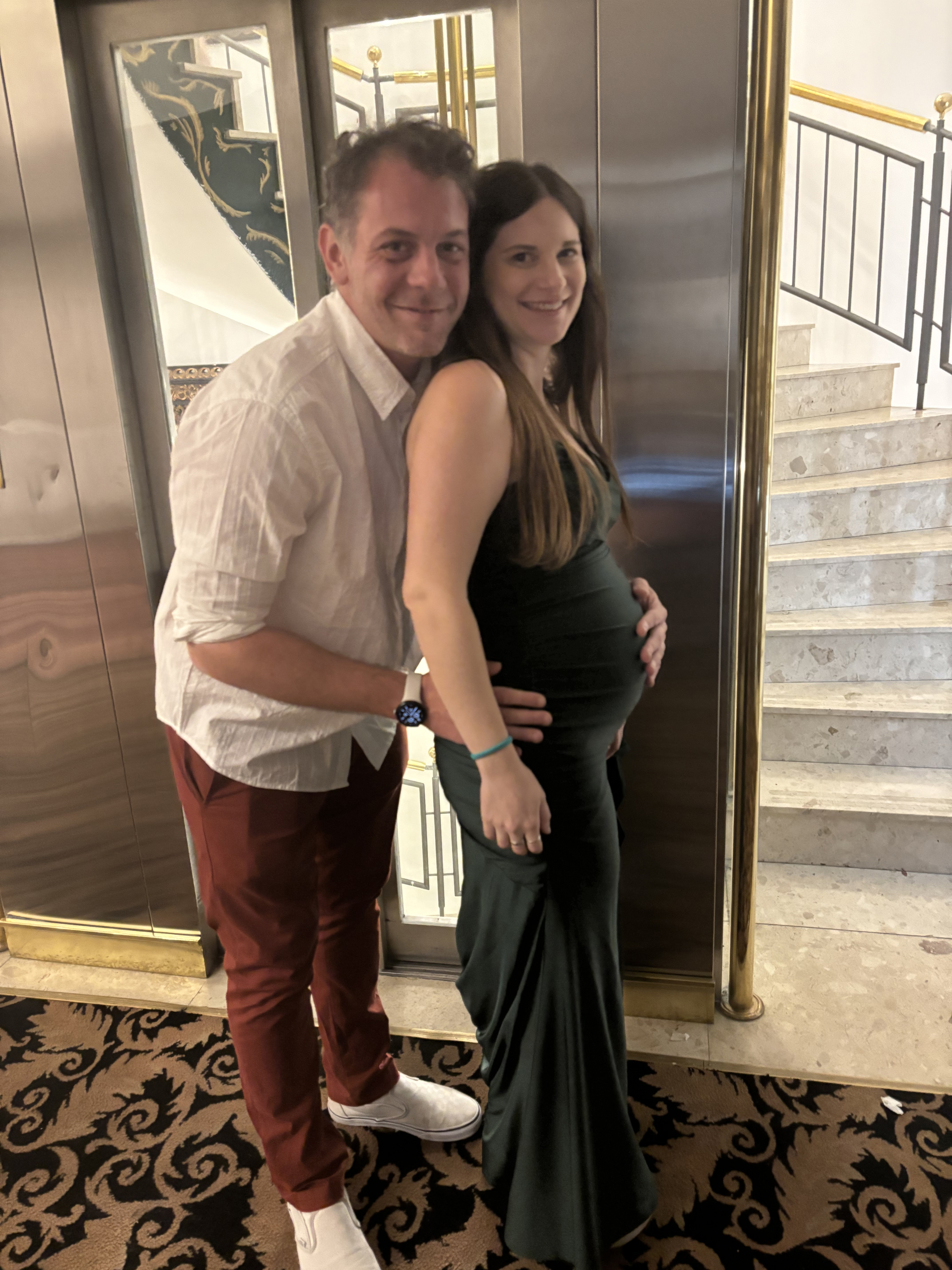 Pregnant me with Fer (my partner) at a party