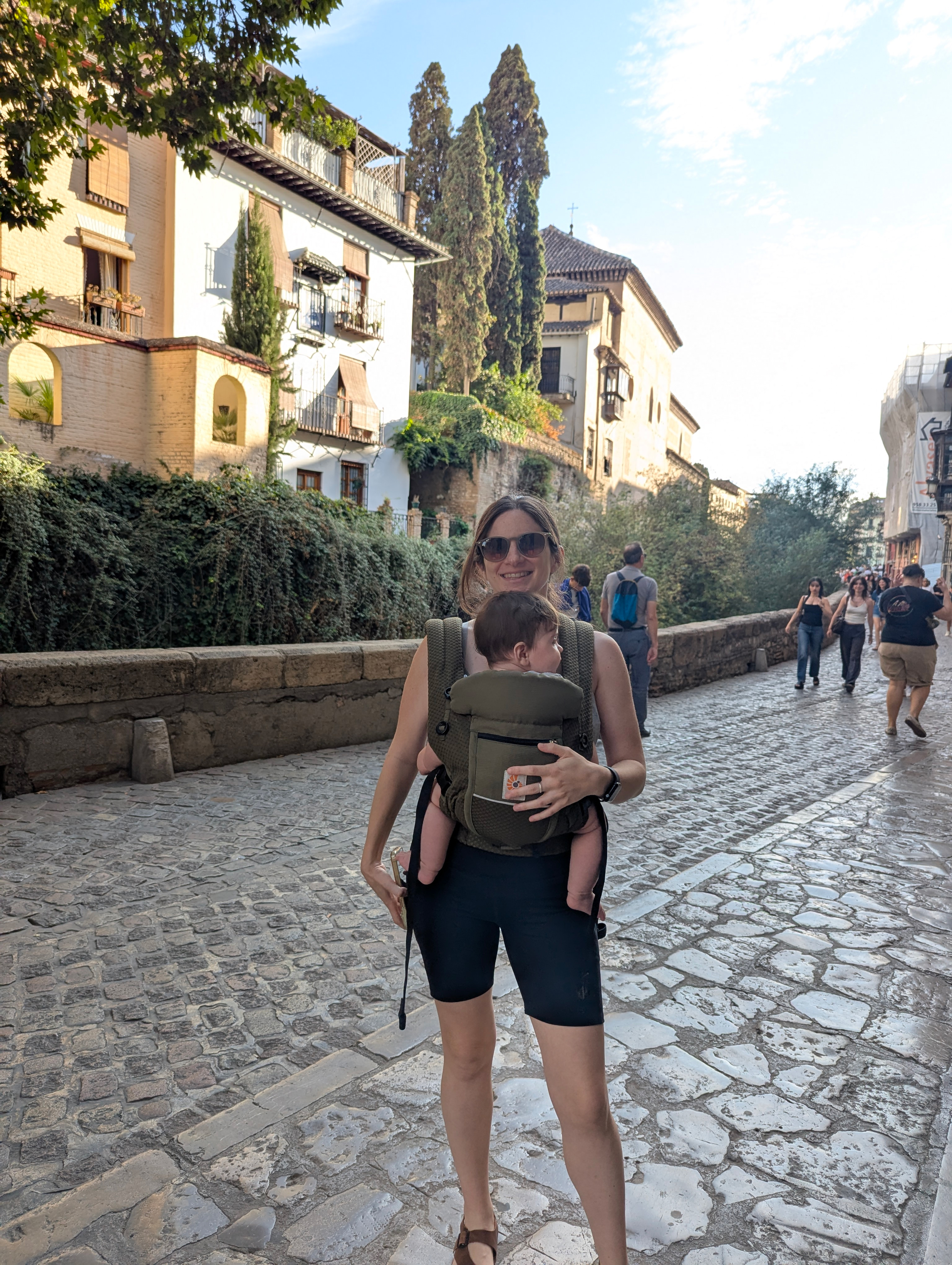 Carrying Nico in a baby carrier while sightseeing in Granada